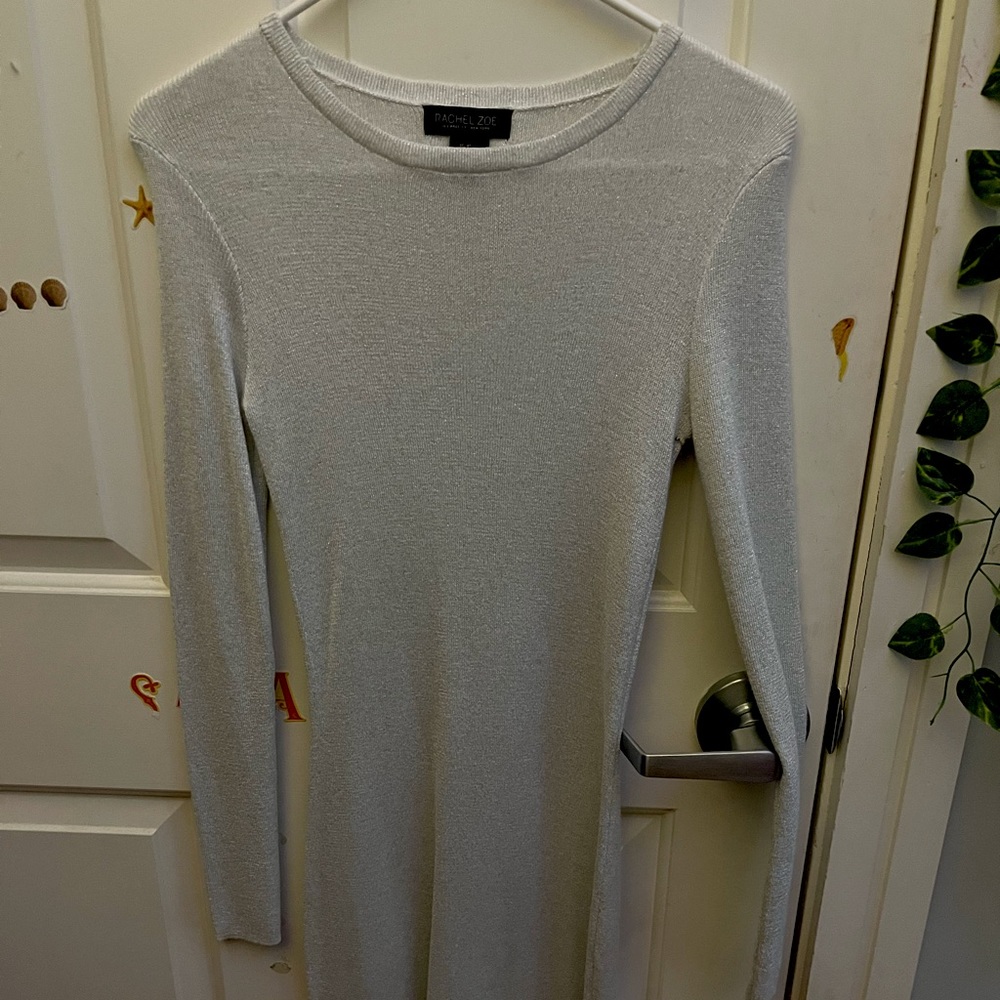 Rachel Zoe size XS but fits small or medium. Color is silver. Never worn